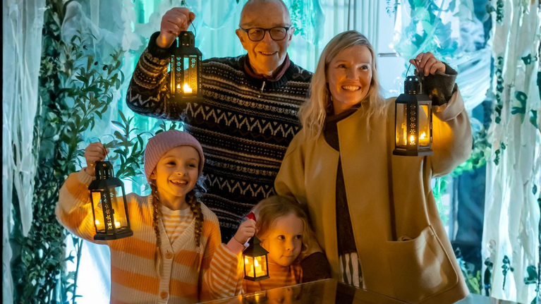 Family with lanterns at Hardwick, Derbyshire